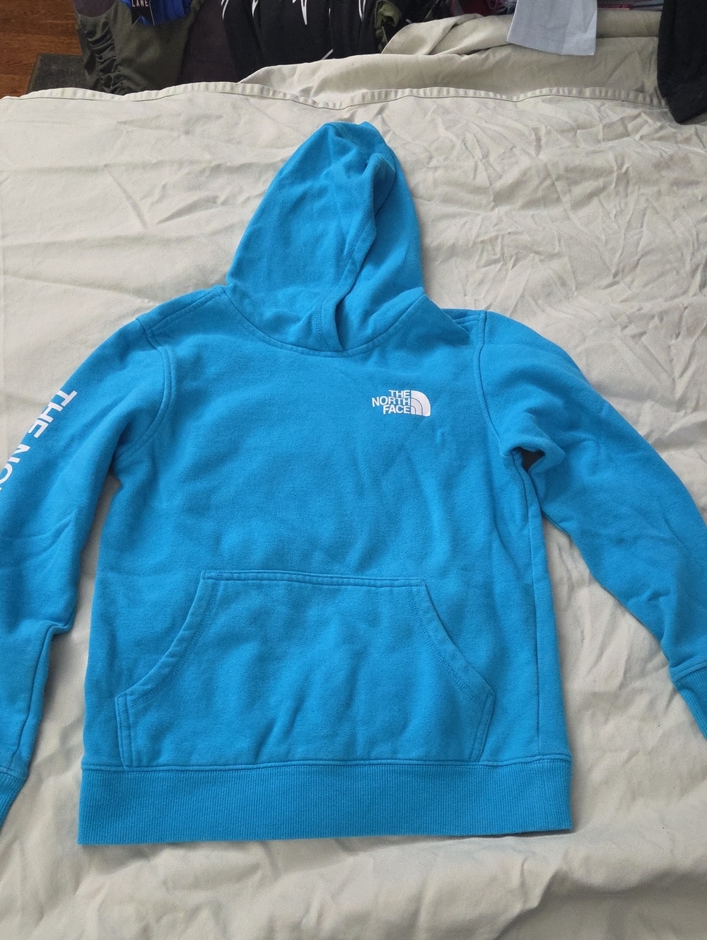The North Face Youth Hoodie in Bright Blue with White Logo - Size 7/8